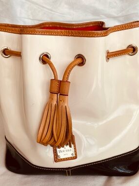 Dooney & Bourke Cream, Tan & Black Leather Drawstring Shoulder Bag with Tassel